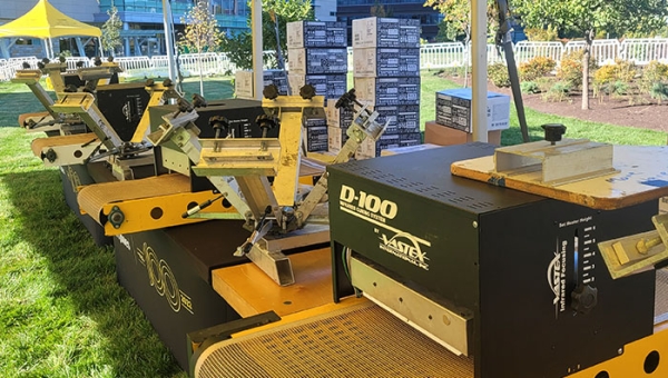 Live Screen Printing vs. Live Heat Pressing: Which On-Site Activation is Right for Your Event?